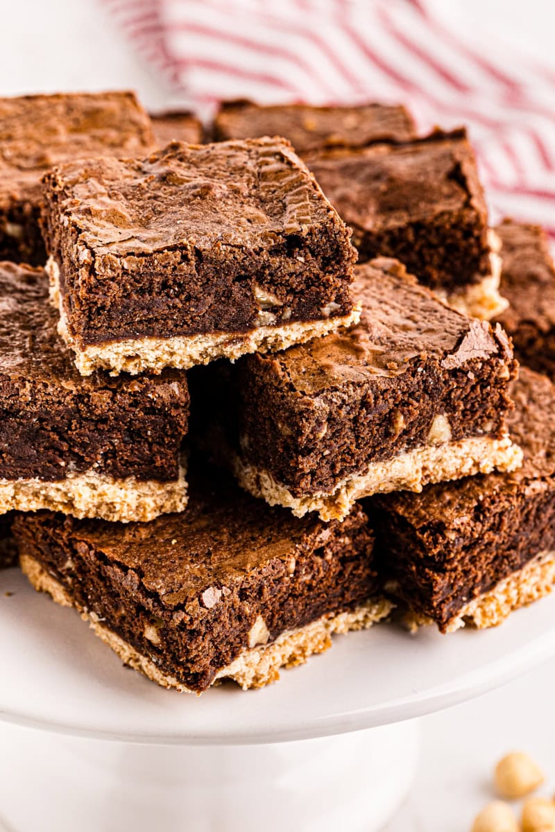 Pile of Nutella brownies on cake stand