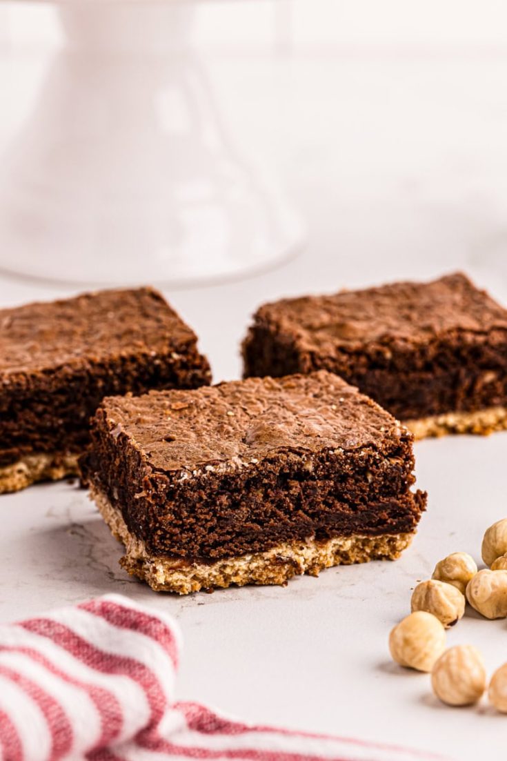 3 Nutella brownies with shortbread crust on countertop