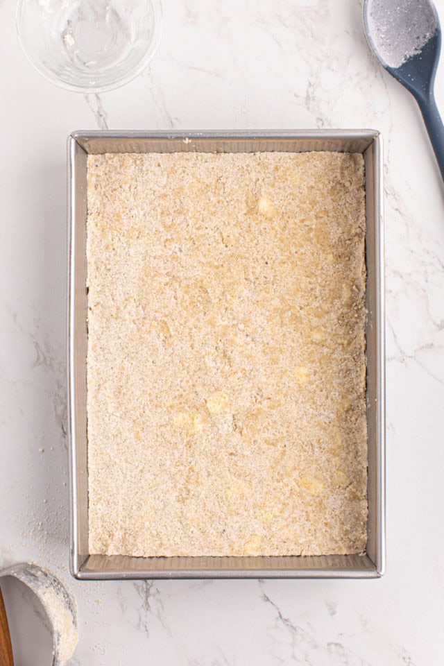 Overhead view of shortbread crust in pan