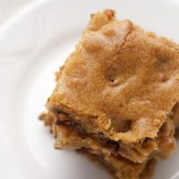 overhead view of Halloween Candy Bar Blondies on a white plate