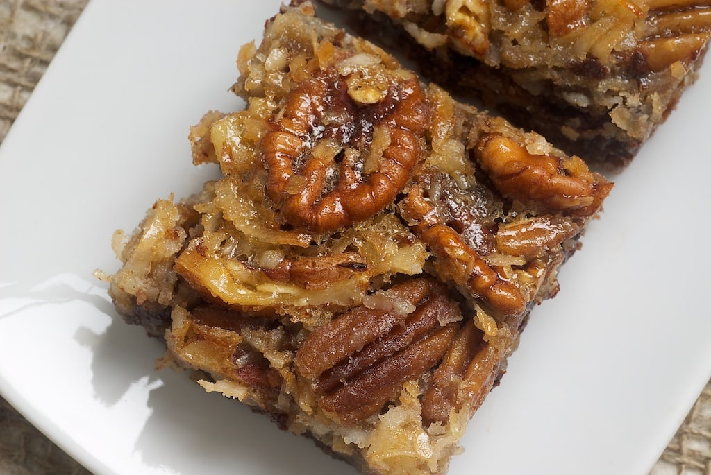 German Chocolate Pecan Pie Bars served on a plate