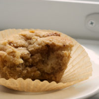 a Pear and Pecan Muffin on a white plate