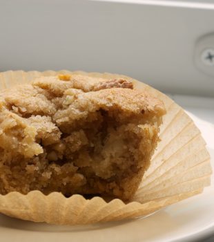 a Pear and Pecan Muffin on a white plate