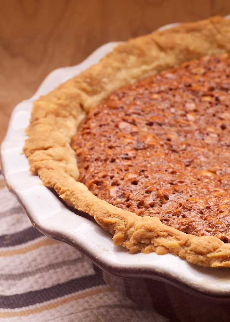 Chocolate Hazelnut Pie in a brown and white pie plate