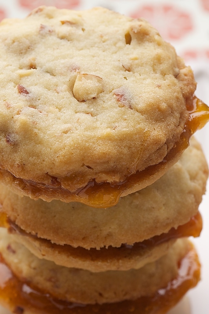 Almond-Apricot Sandwich Cookies are simple almond cookies surrounding sweet apricot preserves. A wonderful flavor combination!
