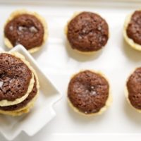 Salty brownie tassies with cream cheese pie crusts.