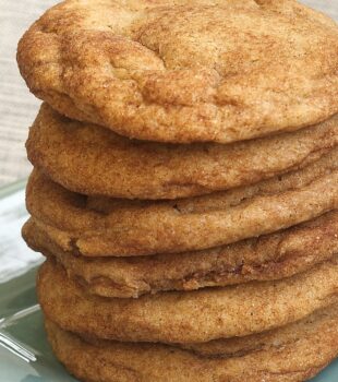 Brown Butter Snickerdoodles stacked on a green plate