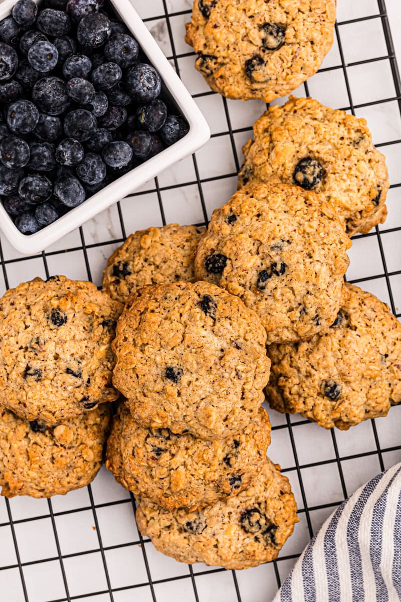 Overhead view of blueberry oatmeal cookies on wire rack