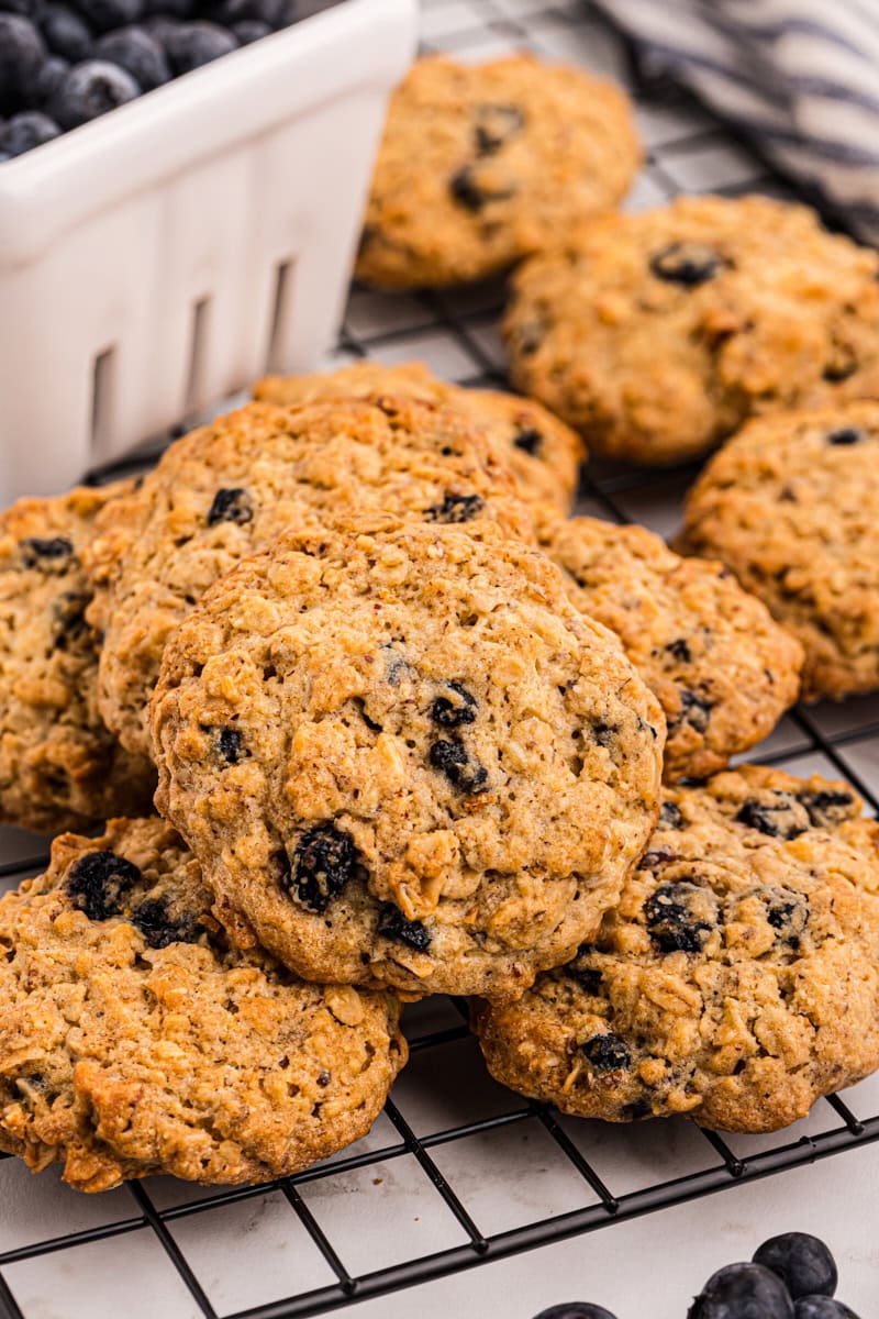 Thick and chewy blueberry oatmeal cookies on wire rack