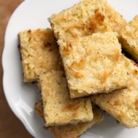 Coconut Bars with Chocolate Shortbread Crust served on a plate