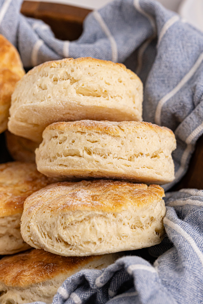 Buttermilk biscuits in bowl lined with tea towel