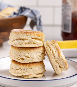 Stack of homemade buttermilk biscuits on plate