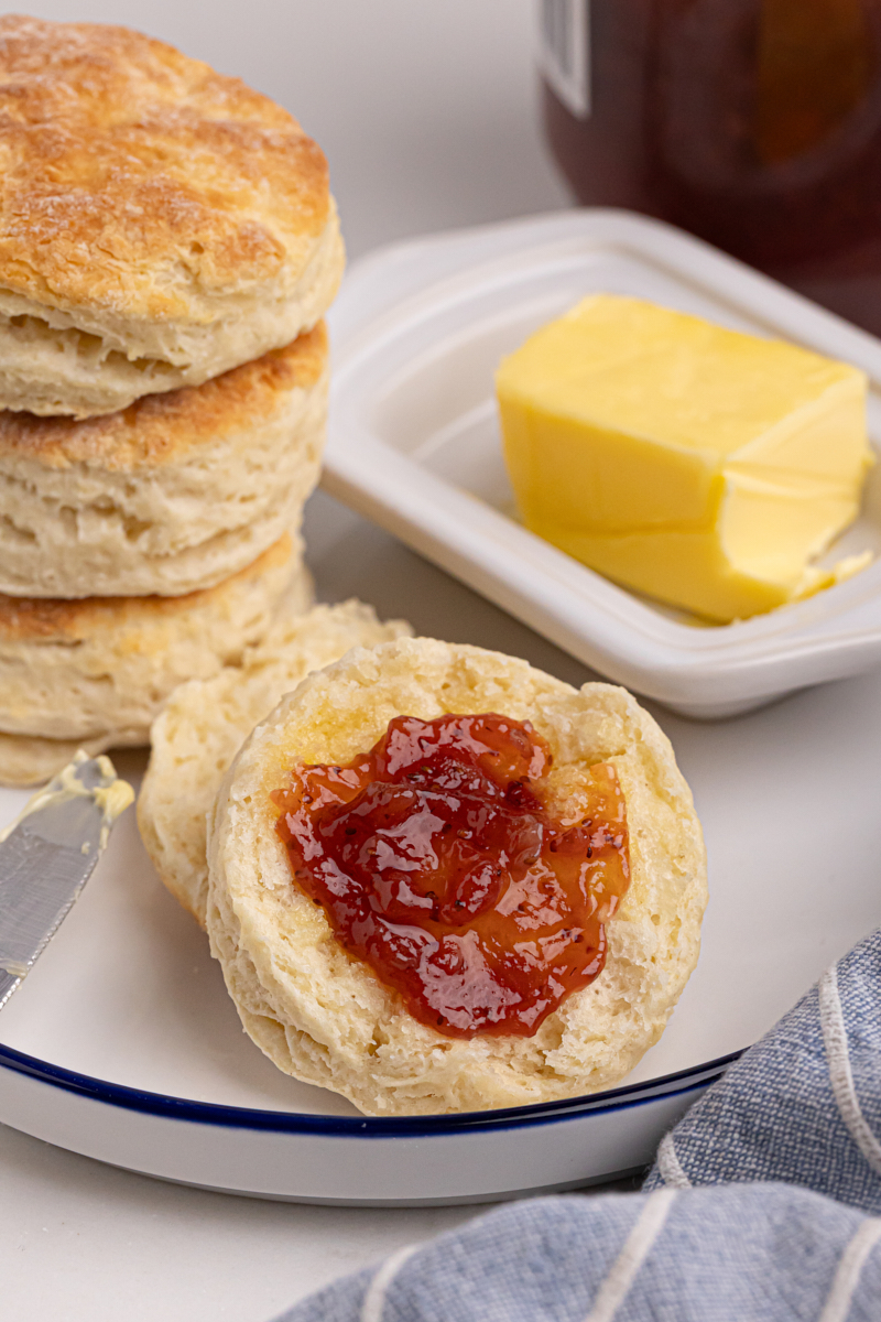 Buttermilk biscuit topped with butter and jam