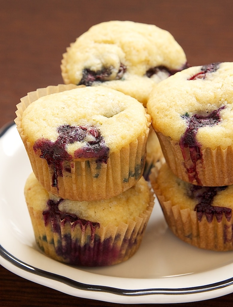 Blueberry Sour Cream Mini Muffins have plenty of fresh blueberries along with a hint of lemon. They are just the thing for a special breakfast treat! - Bake or Break