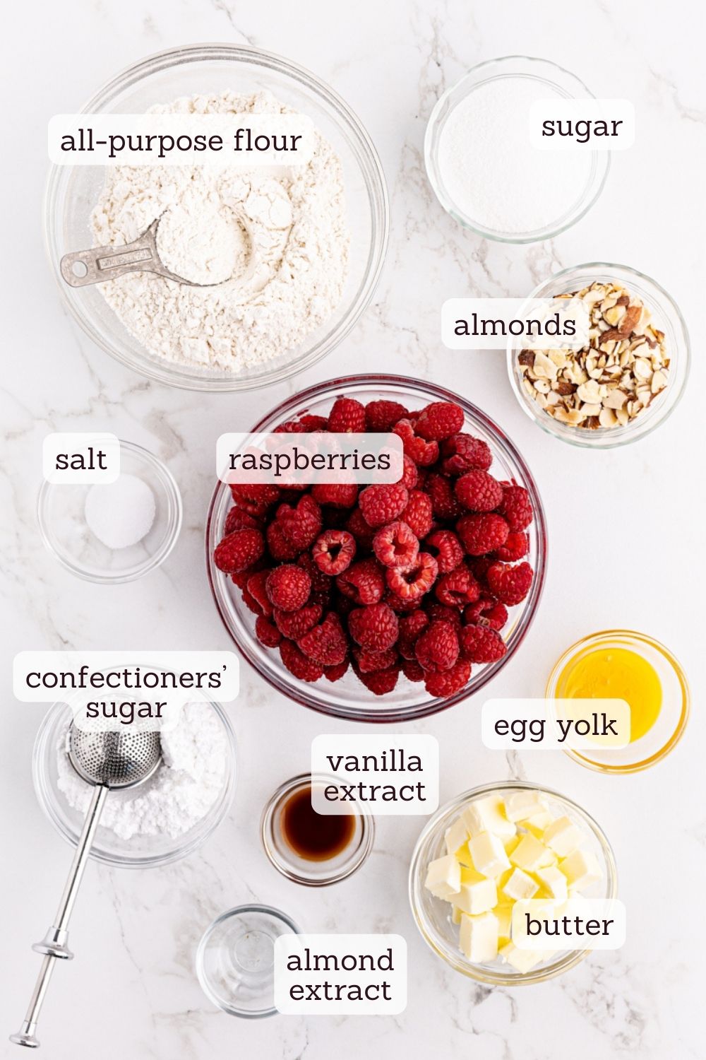 Overhead view of ingredients for raspberry crumb tart