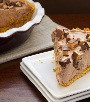 A slice of Peanut Butter Cup Icebox Pie on a plate