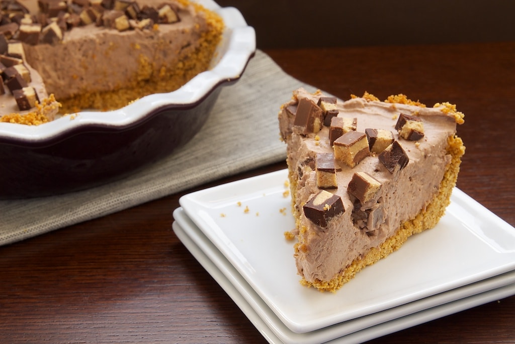 A slice of Peanut Butter Cup Icebox Pie on a plate