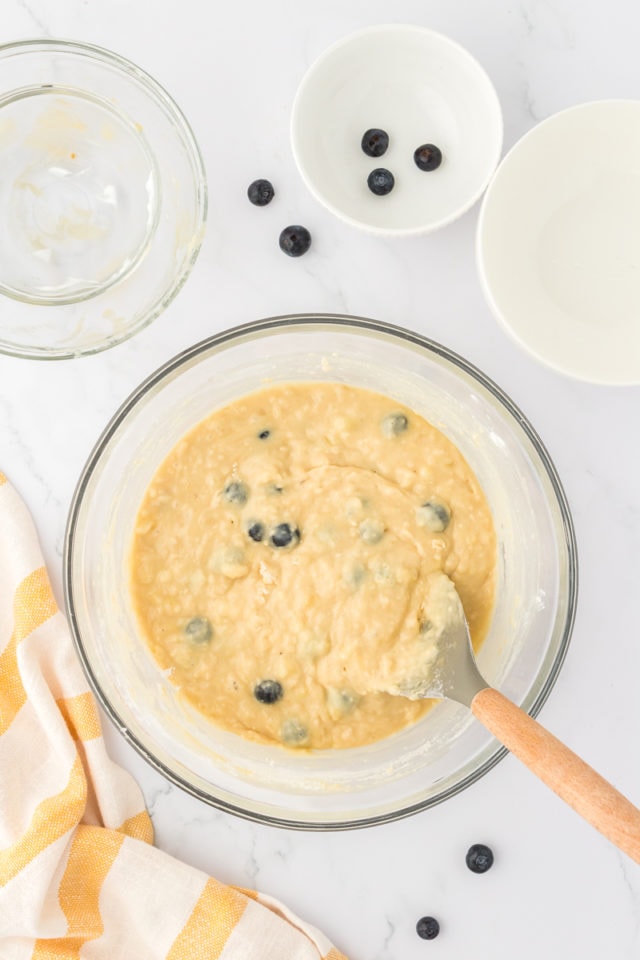 Blueberry banana bread batter in a mixing bowl.