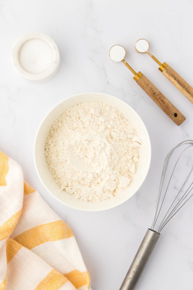 Flour and the other dry ingredients poured into a mixing bowl.