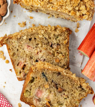 Two pieces of rhubarb bread sliced off of loaf