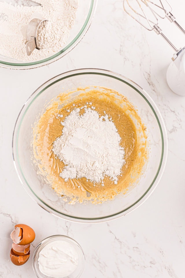 Dry ingredients added to bowl of cake batter