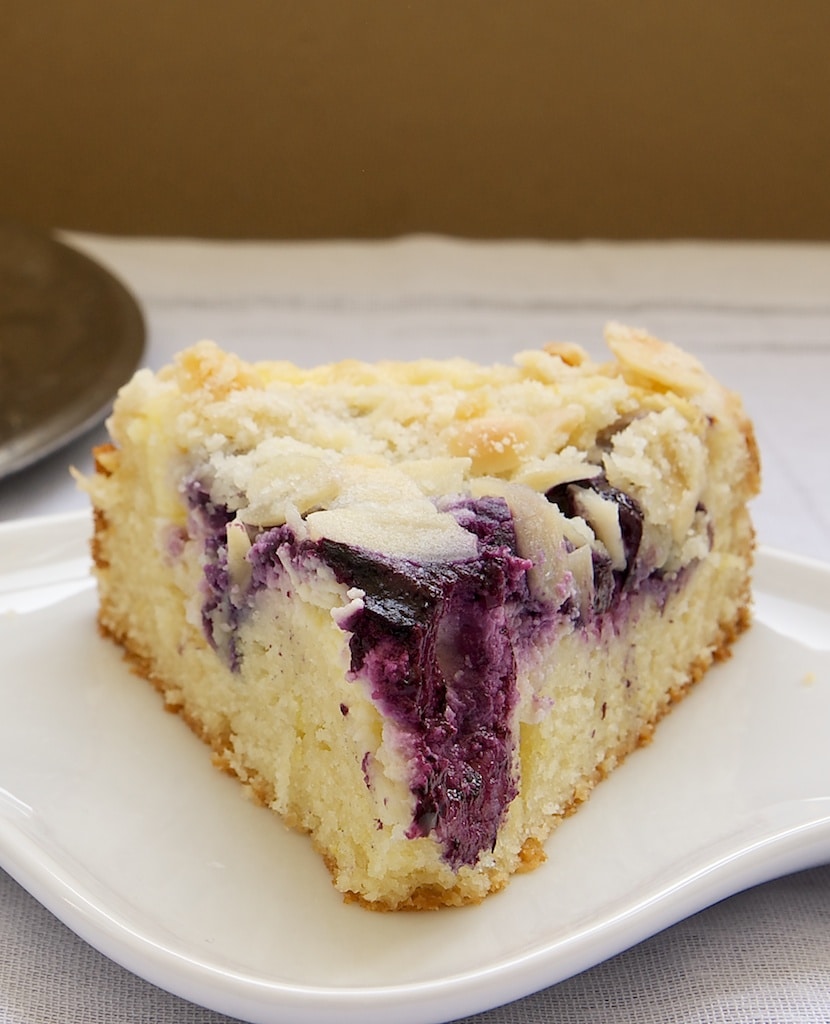 Fresh blueberries, cream cheese, almonds, and a buttery cake combine in Blueberry Cream Cheese Coffee Cake. Perfect for everything from brunch to dessert!