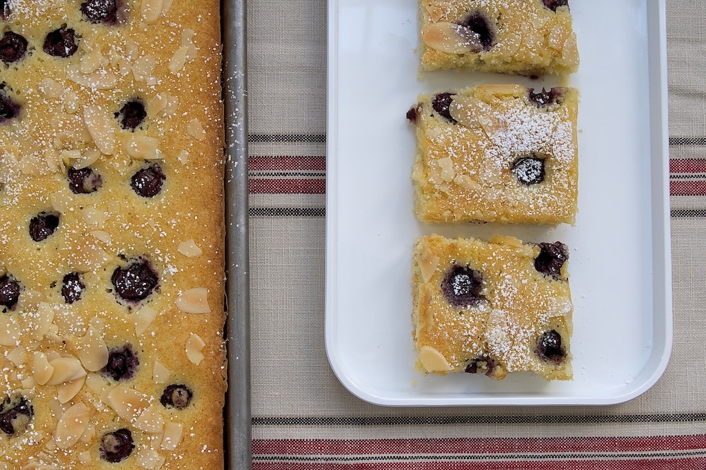 Enjoy fresh cherries and crunchy almonds together in this Cherry Almond Sheet Cake.