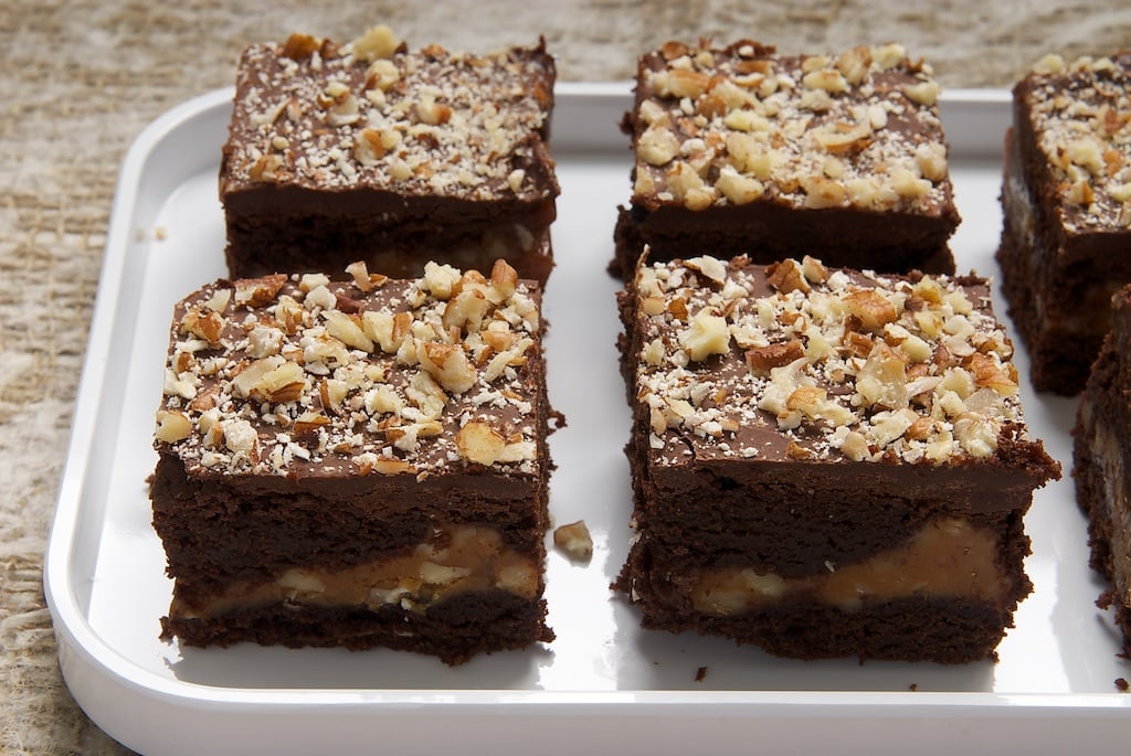 Caramel Pecan Brownies feature layers of rich brownies, nutty caramel, even more chocolate, and crunchy pecans. Delicious!