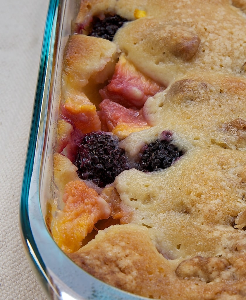 Blackberry Peach Cobbler in a glass baking dish