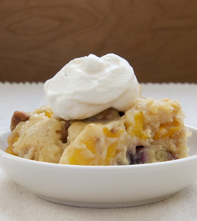 Blackberry Peach Cobbler served in a shallow white bowl