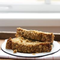 slices of Rhubarb Crumb Bread on a white plate