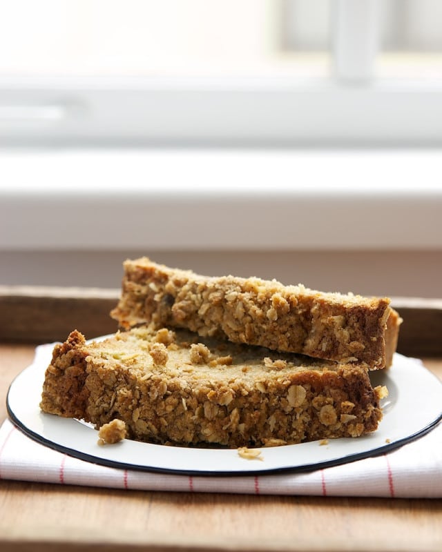 slices of Rhubarb Crumb Bread on a white plate