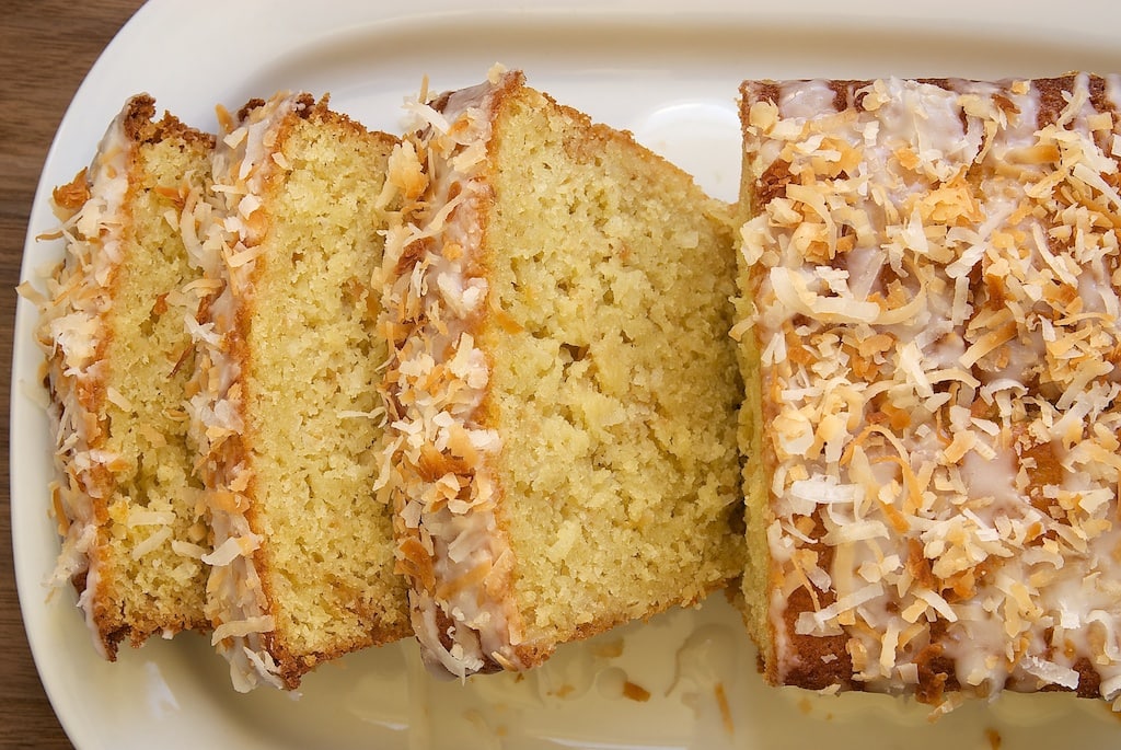 Overhead view of Coconut Buttermilk Pound Cake with 3 slices cut