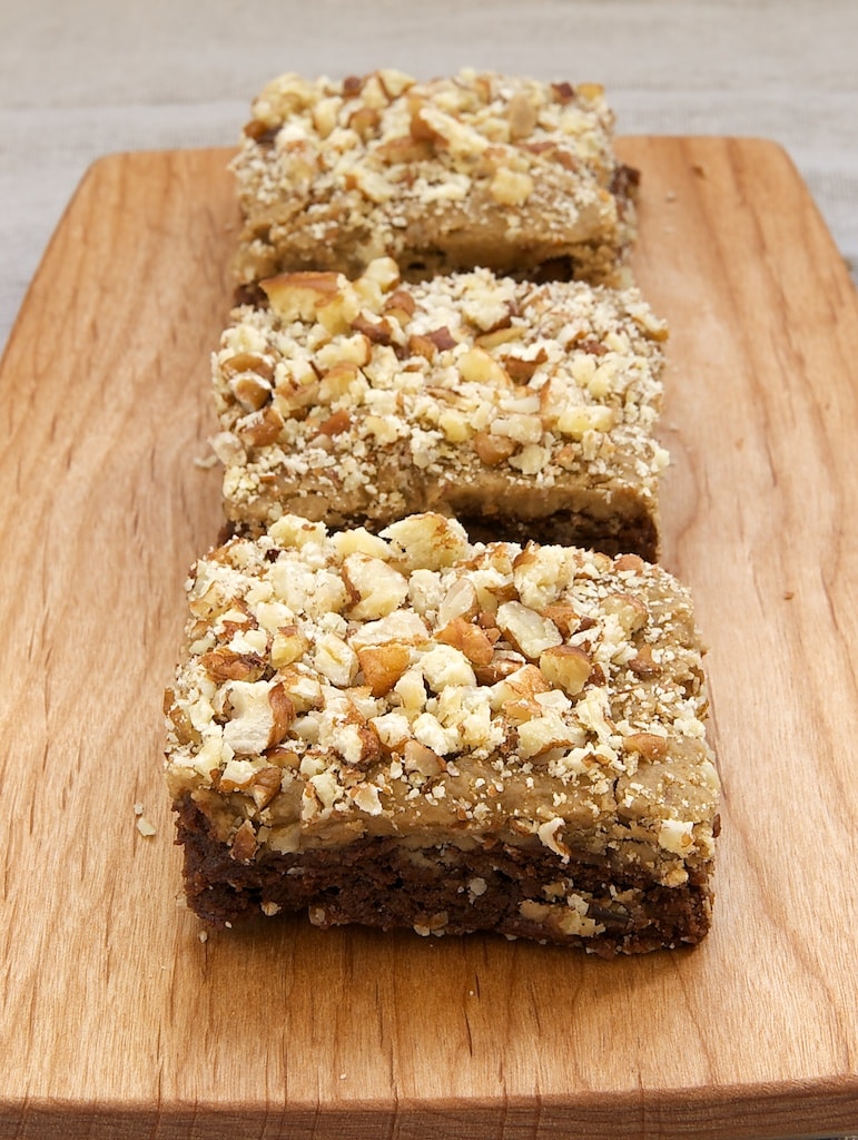 Frosted Caramel-Pecan Brownies combine rich brownies with a delicious caramel frosting and a sprinkling of pecans.