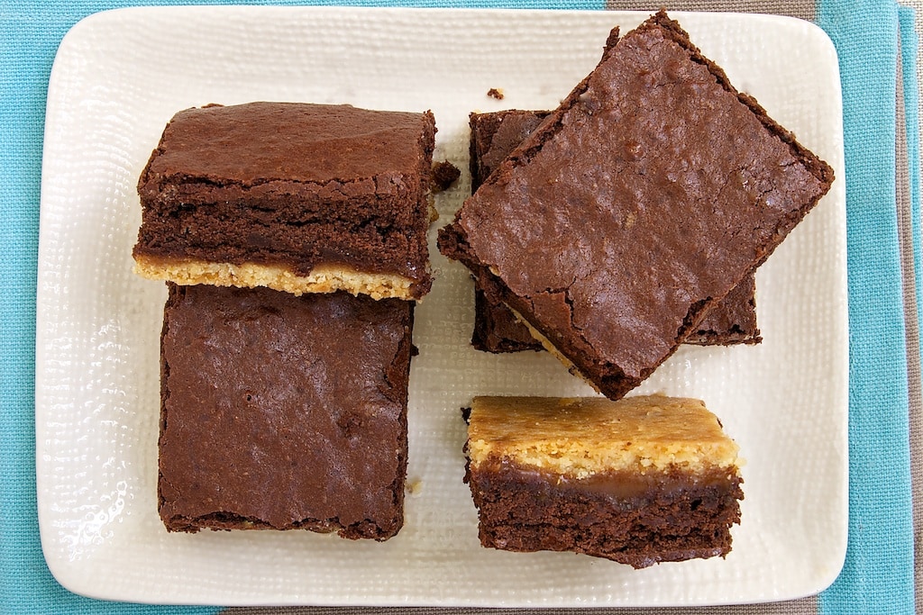 Caramel Popcorn Shortbread Brownies feature rich brownies, caramel, and a crust flavored with caramel popcorn. - Bake or Break