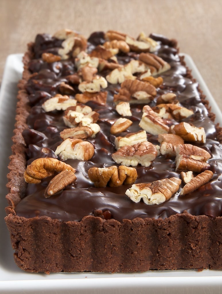 Chocolate-Pecan Tart on a long white serving tray