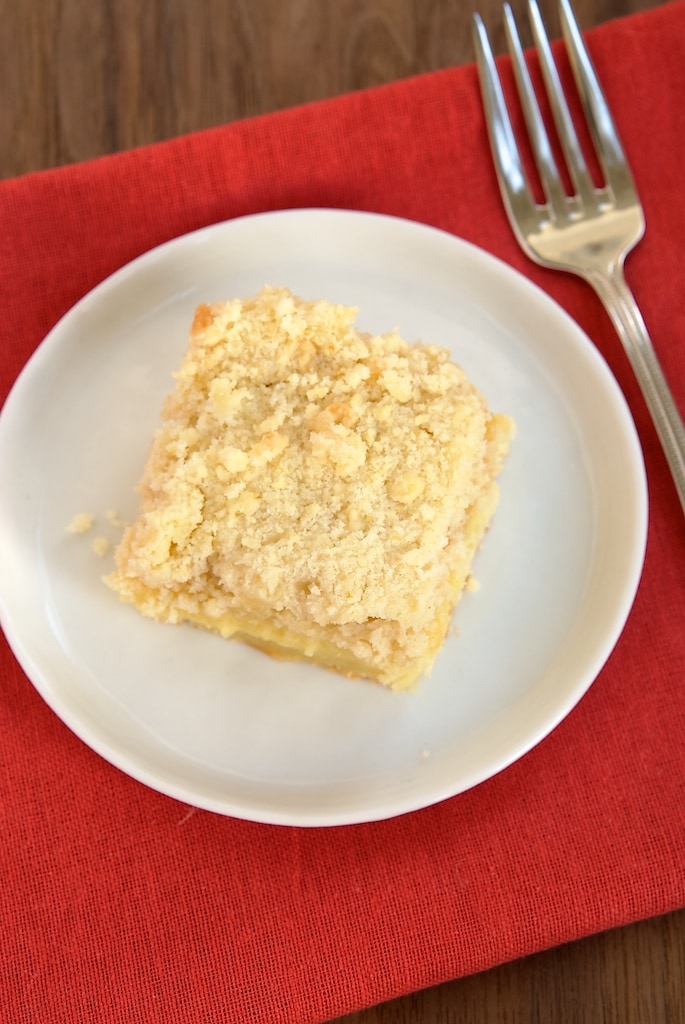 Fresh lemons and lemon curd star in this lovely, delicate Lemon Yogurt Crumb Cake.