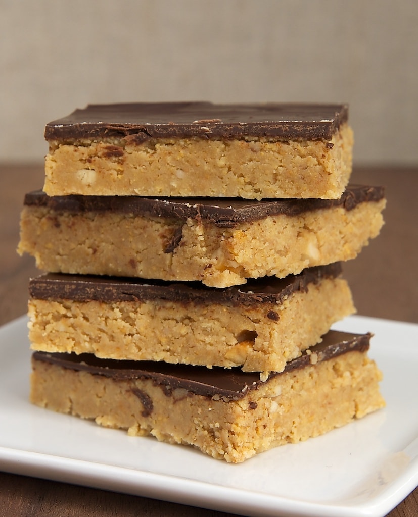 stack of No-Bake Peanut Butter Chocolate Bars on a white plate