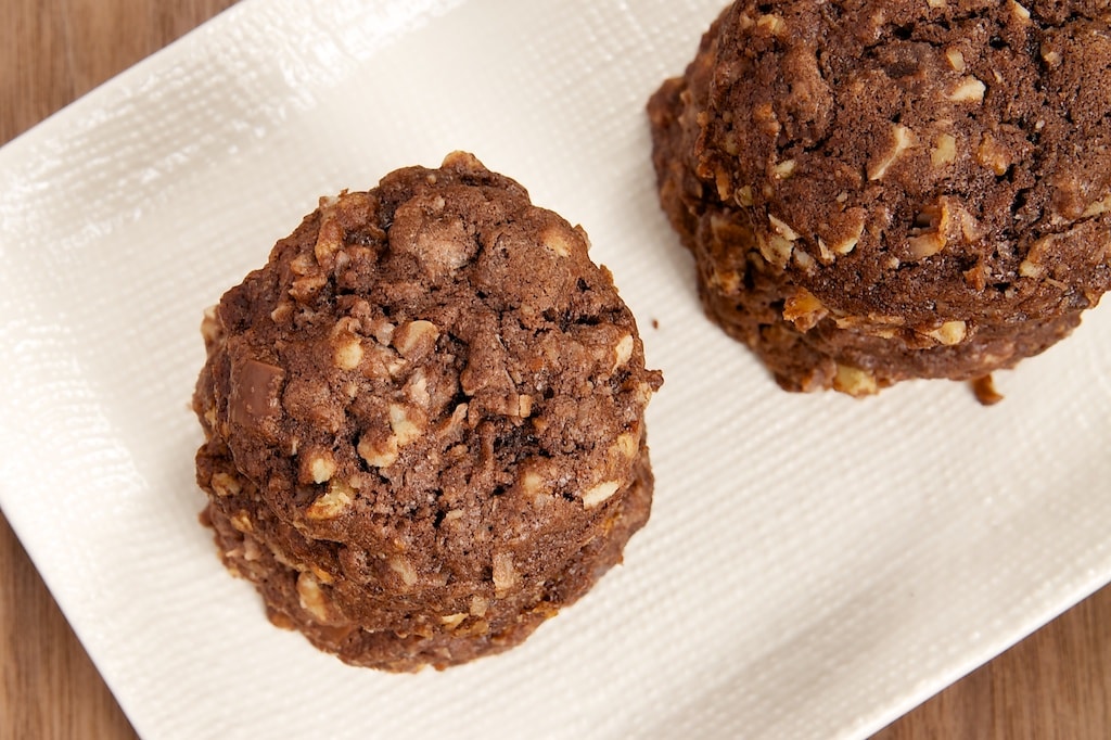 Triple Chocolate Coconut Cookies are big, thick cookies packed with lots of coconut, three kinds of chocolate, and nuts. Delicious!