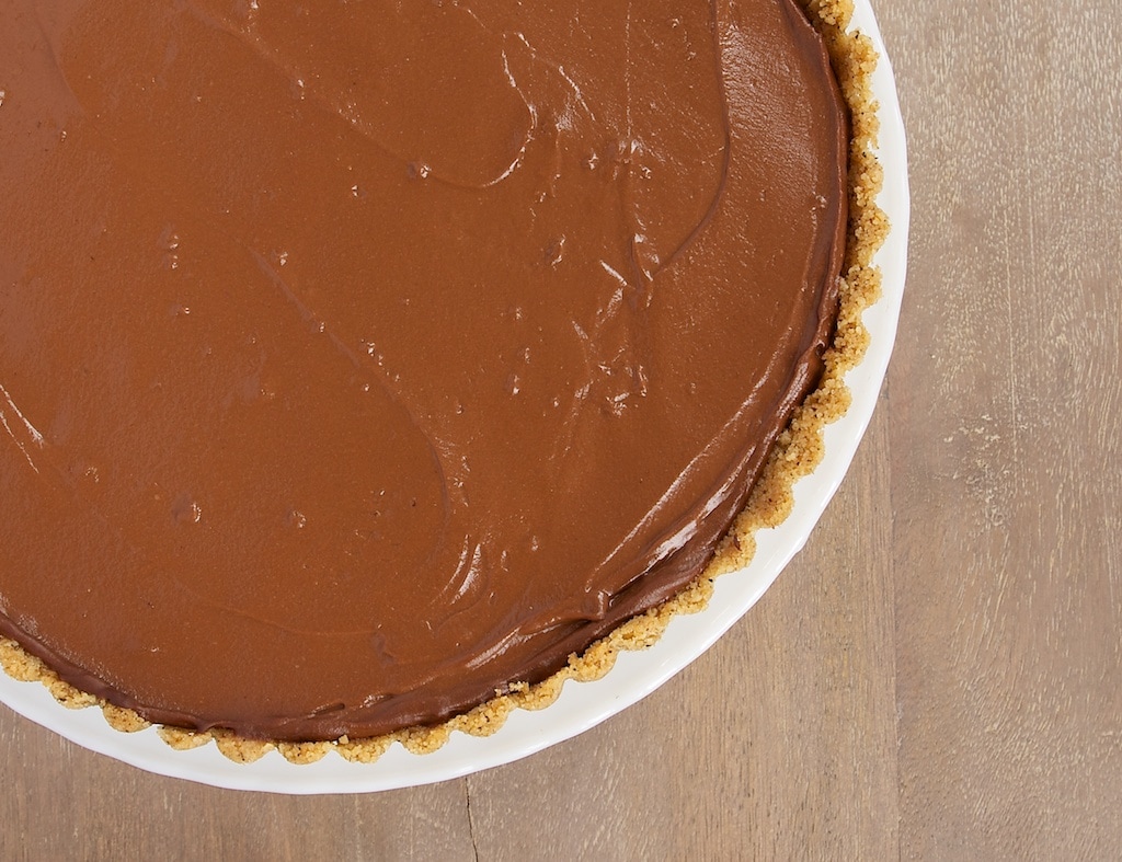 Chocolate Pudding Pie with Peanut Butter Filling is a cool, creamy favorite. Love that little peanut butter surprise inside!