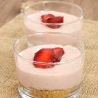 Strawberry No-Bake Cheesecakes served in clear glasses