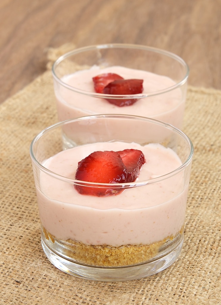 Strawberry No-Bake Cheesecakes served in clear glasses