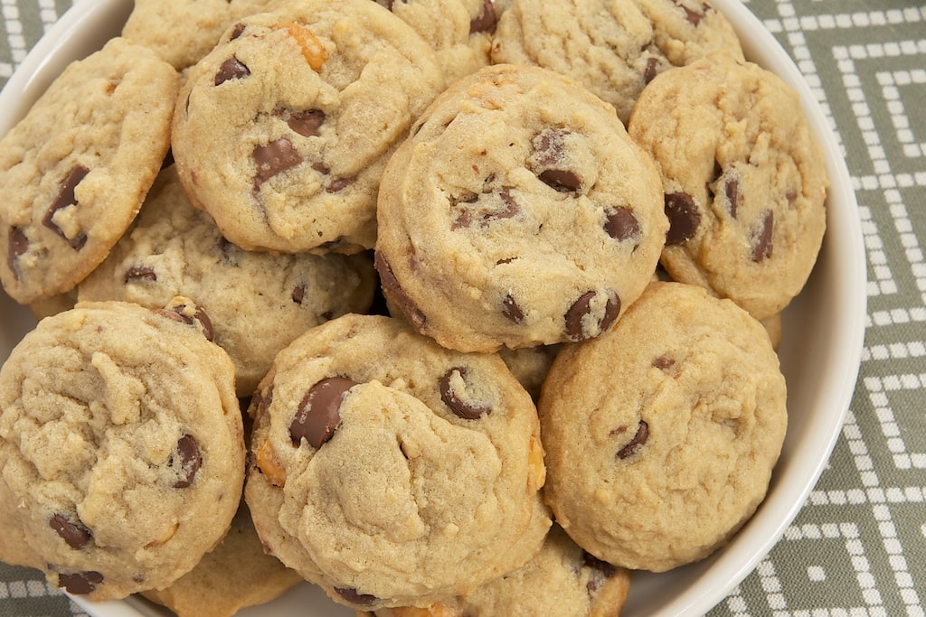 Triple Peanut Triple Chocolate Chip Cookies are filled with peanut butter, peanuts, peanut butter cups, and lots of chocolate. A must for fans of chocolate and peanut butter! - Bake or Break