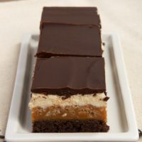 Caramel Crunch Brownies are layer upon layer of good stuff, from caramel to chocolate to nougat. - Bake or Break