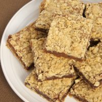 Oatmeal Brownie Bars are a delicious mashup of two favorites - oat bars and brownies. - Bake or Break