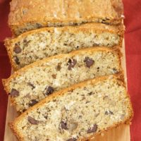 overhead view of Chocolate, Coconut, and Pecan Bread on a wooden serving board