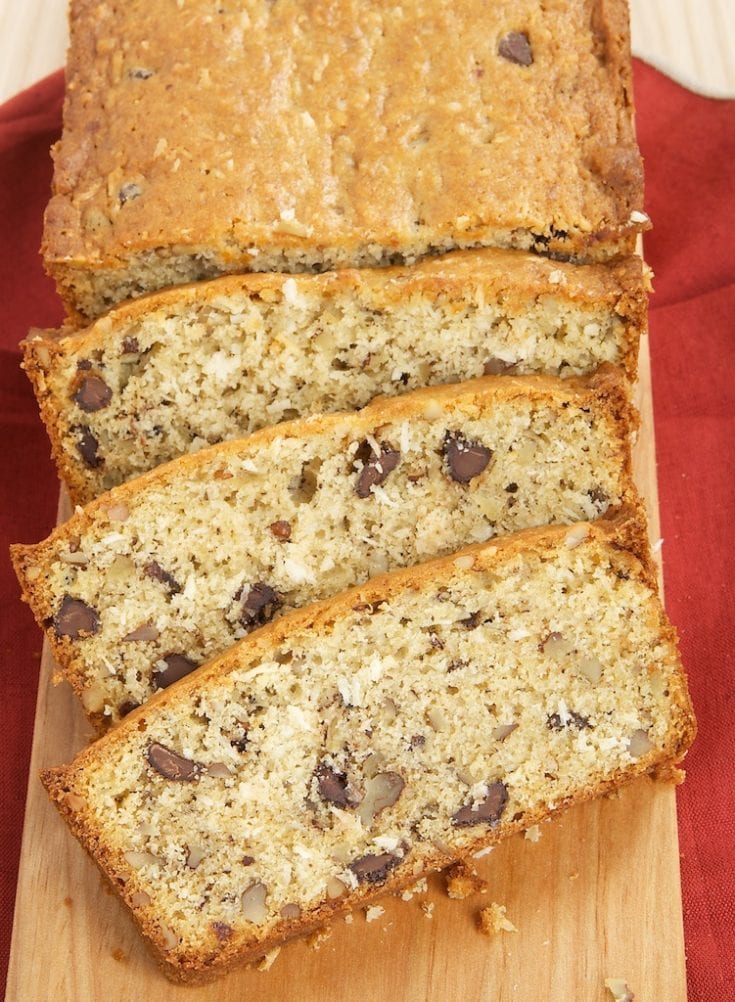 overhead view of Chocolate, Coconut, and Pecan Bread on a wooden serving board