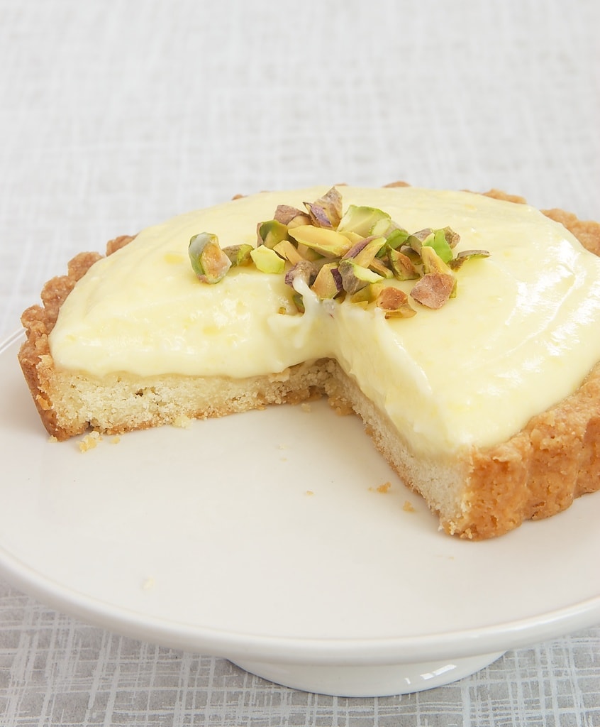 Lemon Cream Tart with a slice missing