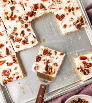 Sliced brown butter Texas sheet cake in pan