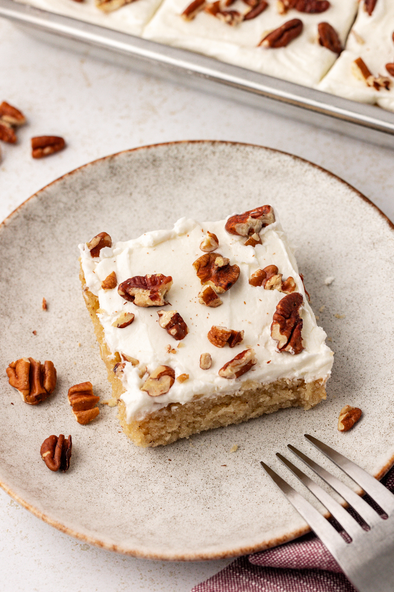 Square of brown butter Texas sheet cake on plate